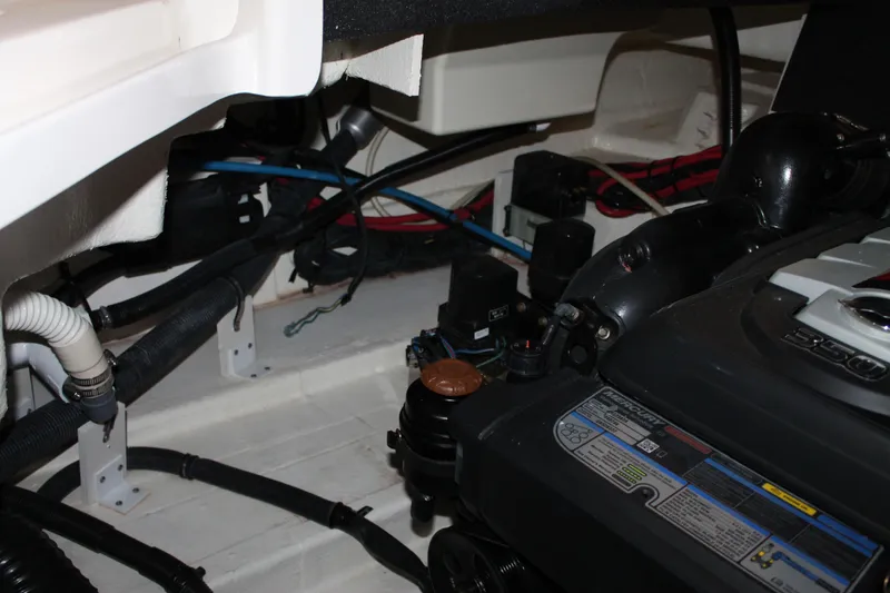 Slide: The Image of Engine compartment of a 2018 Sea Ray 280 SLX boat, showing wiring and components. - 28
