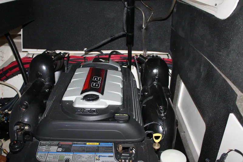 Slide: The Image of Engine compartment of a 2018 Sea Ray 280 SLX boat, featuring a 6.2L Mercury engine. - 29