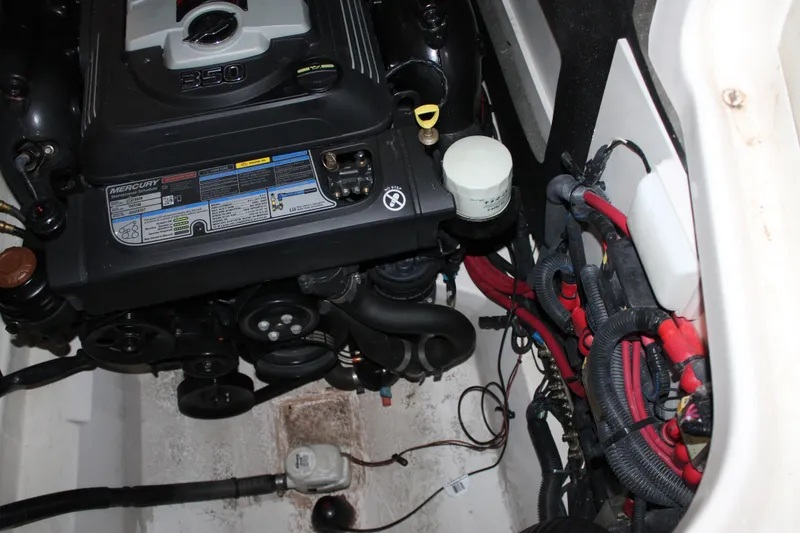 Slide: The Image of Engine compartment of a 2018 Sea Ray 280 SLX boat, featuring a Mercury 350 engine. - 30