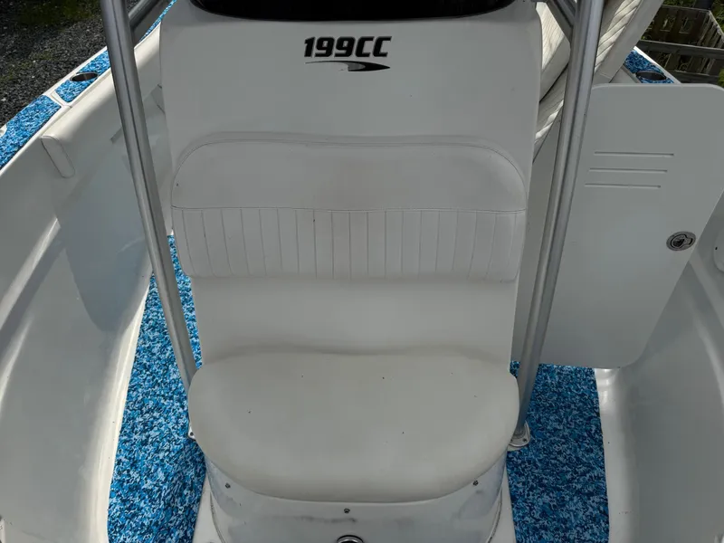 Slide: The Image of 2013 Sea Fox 199 Commander boat seat with blue flooring. - 11