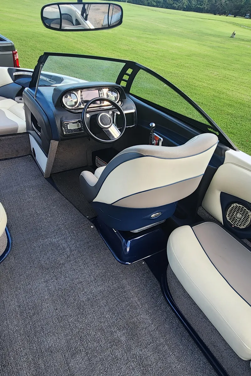 Slide: The Image of Interior of 2013 Malibu Wakesetter 23 LSV boat with sleek dashboard and seating. - 8