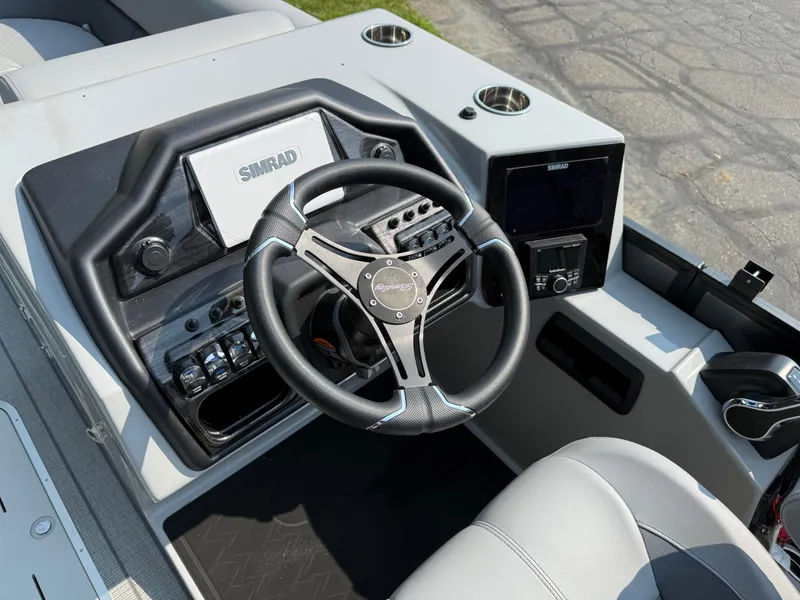 Slide: The Image of 2026 Bentley Pontoons Elite 223 Swingback Dual Capt. helm with Simrad electronics and modern controls. - 13