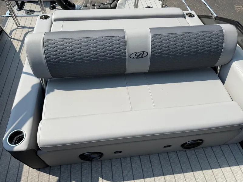 Slide: The Image of 2026 Bentley Pontoons Elite 223 Swingback Dual Capt. seating with cup holders and stylish upholstery. - 17