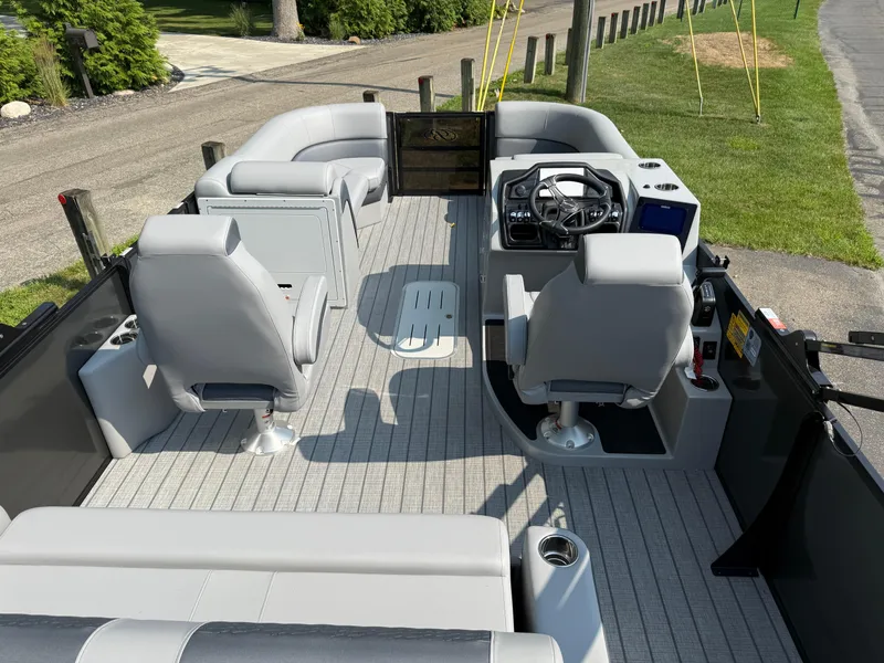 Slide: The Image of 2026 Bentley Pontoons Elite 223 Swingback Dual Capt. interior with modern seating and controls. - 20