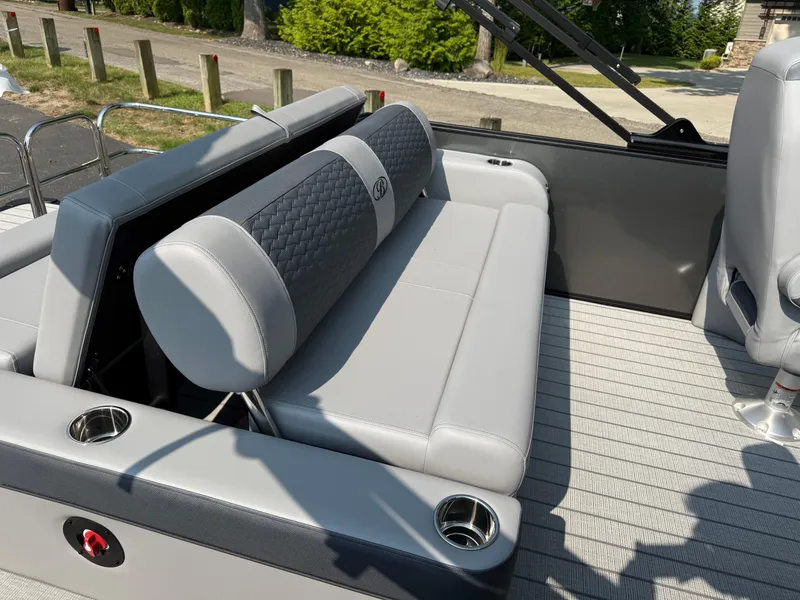 Slide: The Image of 2026 Bentley Pontoons Elite 223 Swingback Dual Capt. with luxurious seating and modern design. - 21