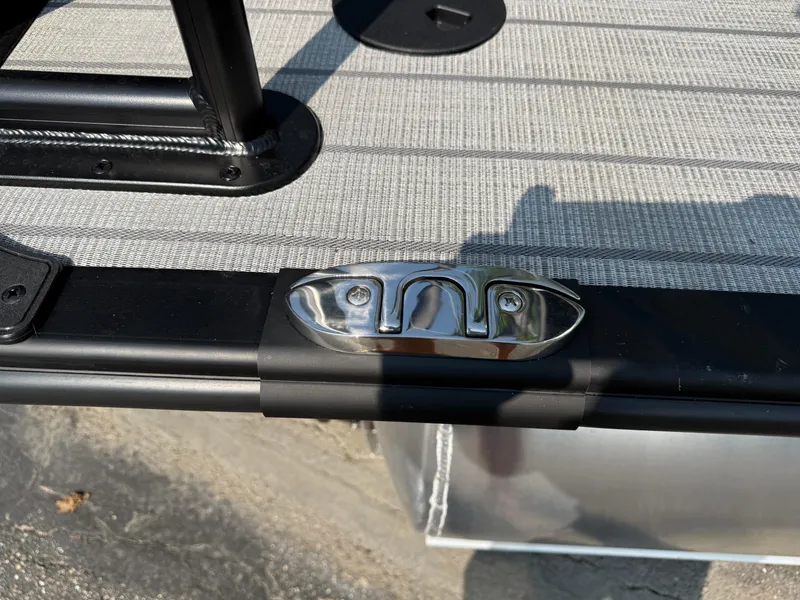 Slide: The Image of 2026 Bentley Pontoons Elite 223 Swingback Dual Capt. deck detail with stainless steel cleat. - 24