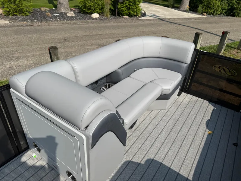 Slide: The Image of 2026 Bentley Pontoons Elite 223 Swingback Dual Capt. with sleek gray seating on deck. - 7