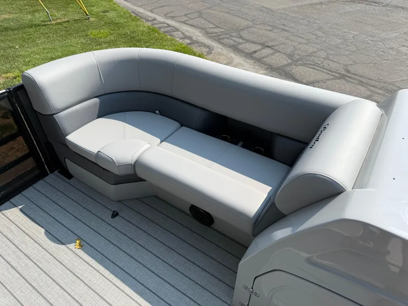 Slide: The Image of 2026 Bentley Pontoons Elite 223 Swingback Dual Capt. with luxurious gray seating. - 8
