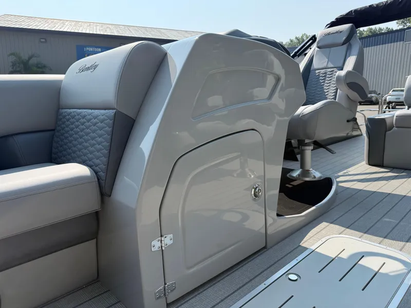 Slide: The Image of 2026 Bentley Pontoons Elite 223 interior with luxurious seating and modern design. - 9