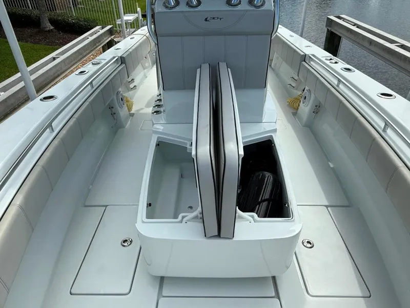 Slide: The Image of 2023 Contender 30 Tournament boat interior with open storage compartments. - 16