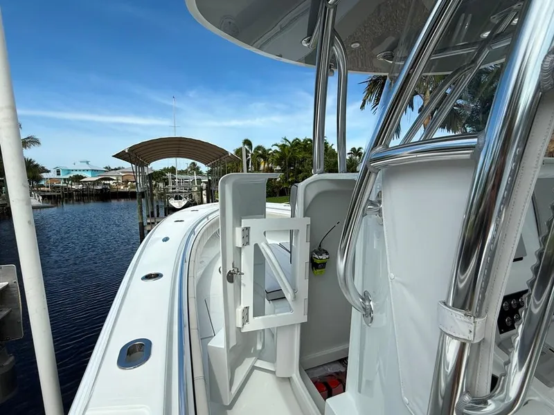 Slide: The Image of 2023 Contender 30 Tournament boat docked, showcasing sleek design and modern features. - 24