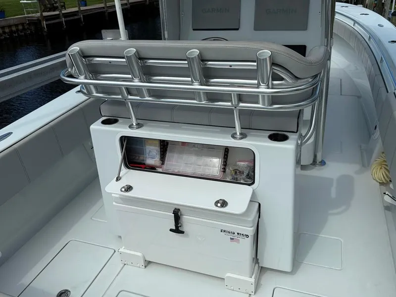Slide: The Image of 2023 Contender 30 Tournament boat with fishing rod holders and storage compartment. - 27