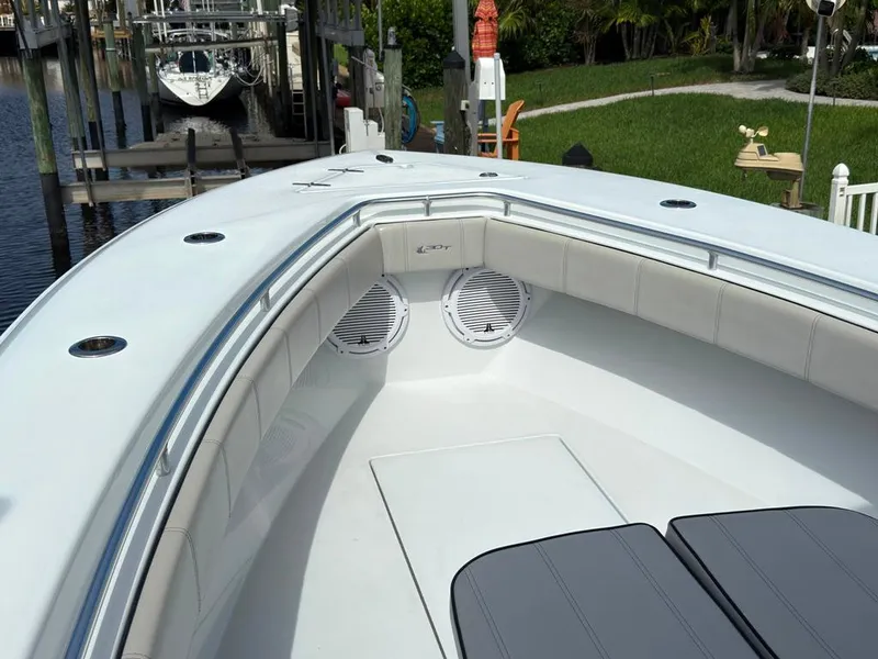 Slide: The Image of 2023 Contender 30 Tournament boat interior with cushioned seating and speakers. - 41