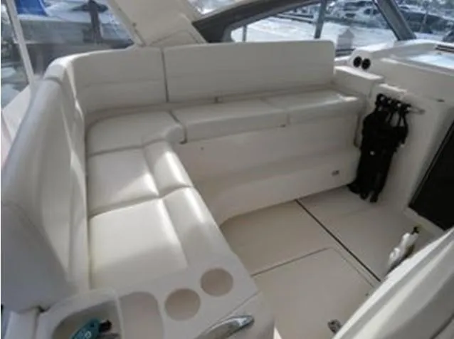 Slide: The Image of Luxurious seating area on a 2000 Tiara Yachts 5200 Express. - 16