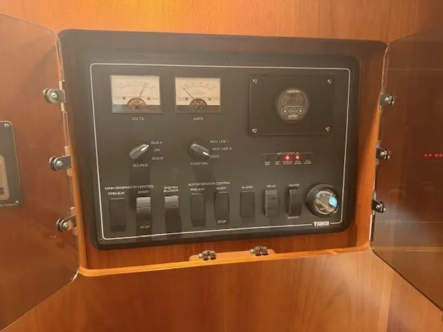 Slide: The Image of Electrical control panel on a 2000 Tiara Yachts 5200 Express boat. - 45