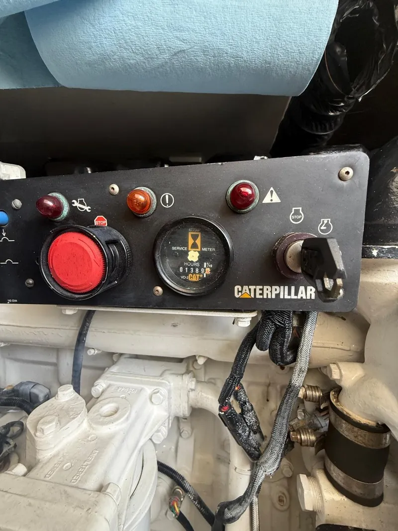 Slide: The Image of Control panel of a 2000 Tiara Yachts 5200 Express with Caterpillar engine. - 49