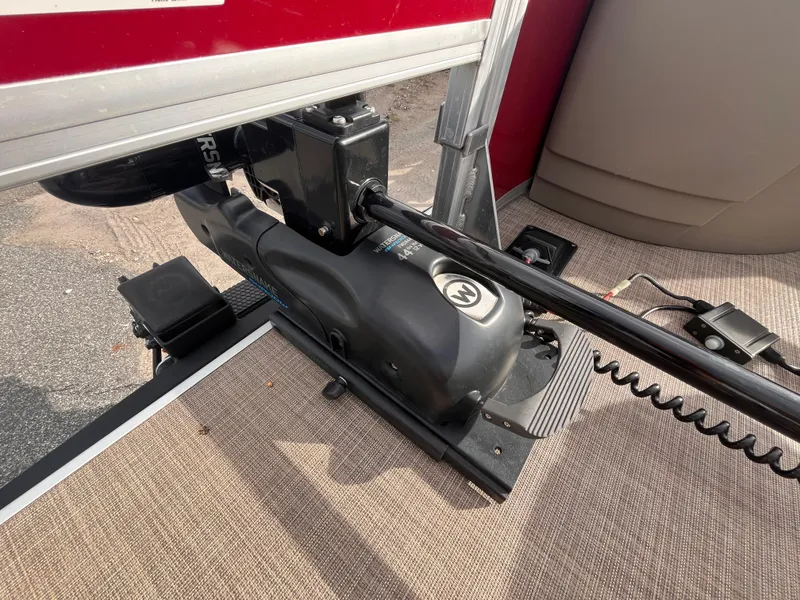 Slide: The Image of 2023 Sun Tracker Bass Buggy 18 DLX boat with trolling motor detail. - 7