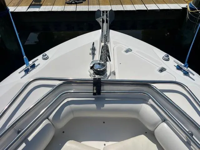 Slide: The Image of Bow of 2004 Boston Whaler 270 Outrage with stainless steel railings and anchor. - 19