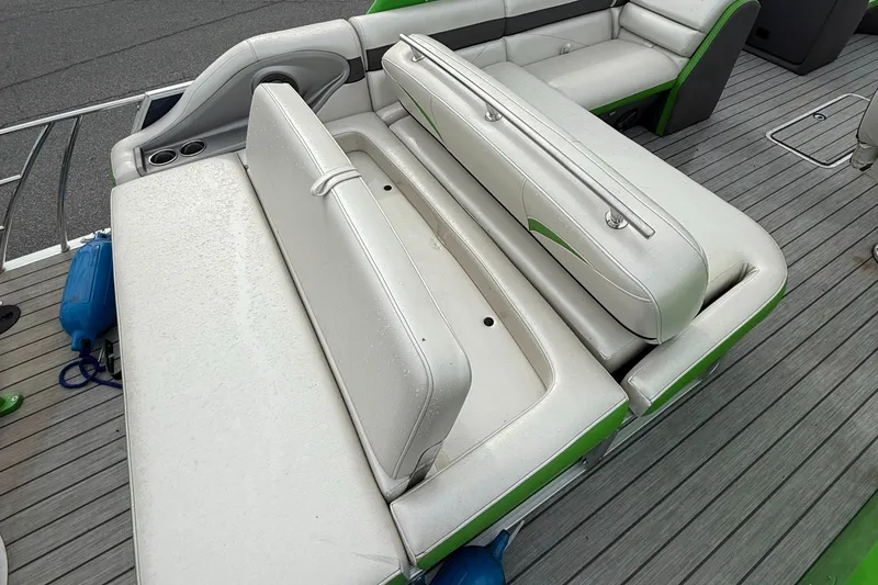 Slide: The Image of 2020 Berkshire 23SB STS Entertainment boat with white and green seating on deck. - 9