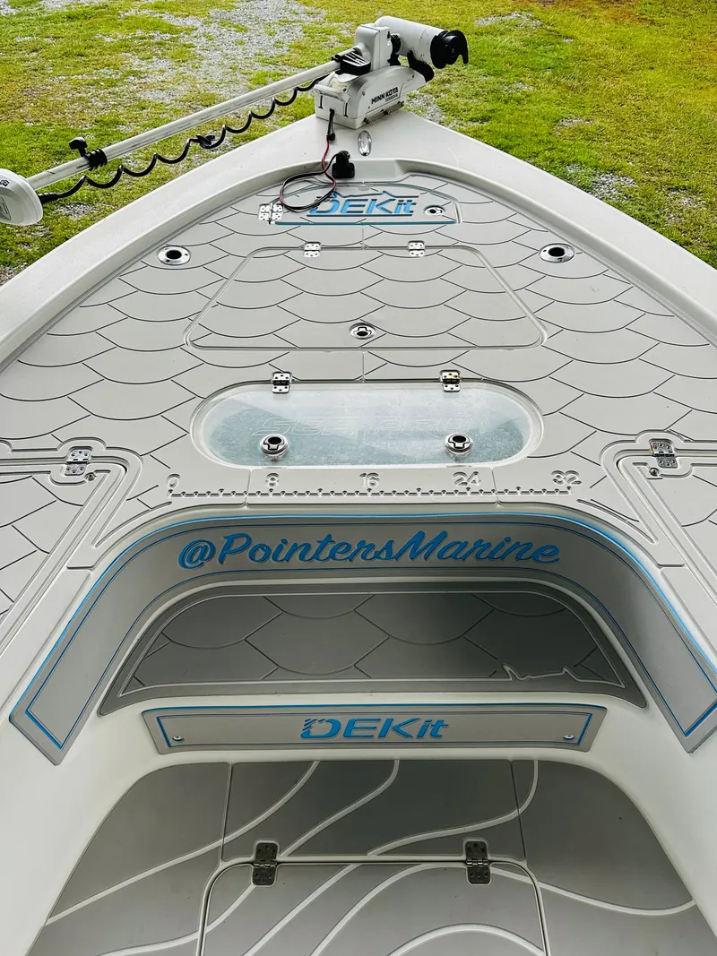 Slide: The Image of 2019 Sea Pro 248 Bay boat deck with DEKit flooring and trolling motor. - 9