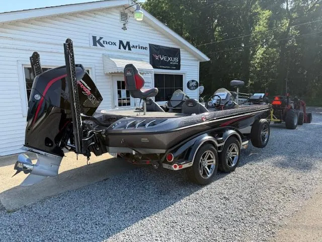 Slide: The Image of 2019 Ranger Z521C boat parked outside Knox Marine dealership. - 3