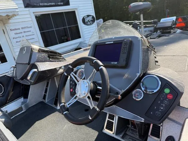 Slide: The Image of 2019 Ranger Z521C boat dashboard with steering wheel and electronic display. - 5