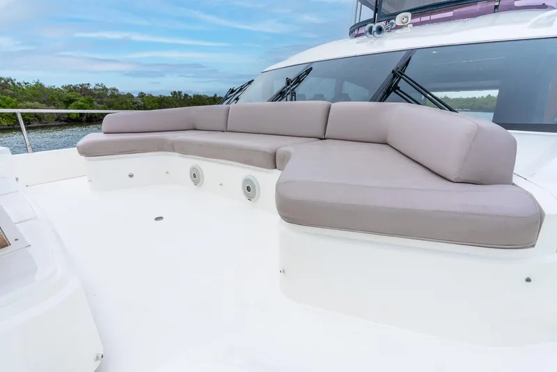 Slide: The Image of Luxurious 2018 Princess F-68 yacht deck with elegant seating and scenic water view. - 13