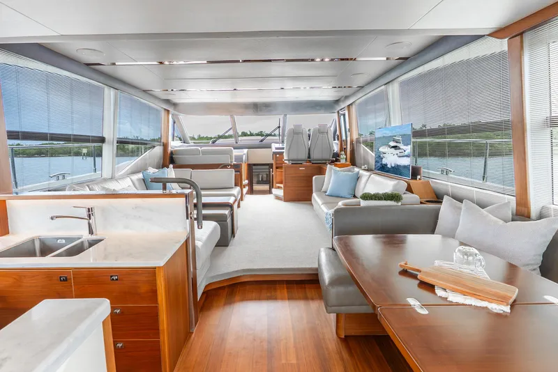 Slide: The Image of Luxurious helm of 2018 Princess F-68 yacht with modern controls and leather seating. - 22