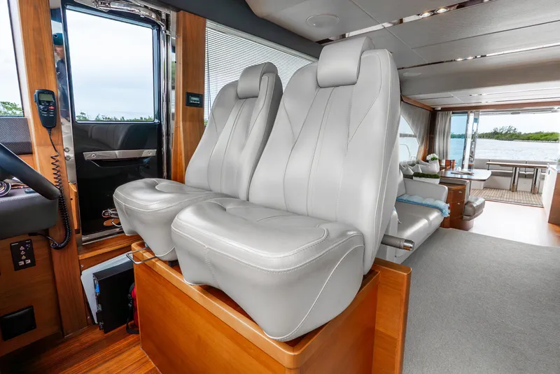Slide: The Image of Luxurious interior of 2018 Princess F-68 yacht with modern seating and elegant decor. - 29