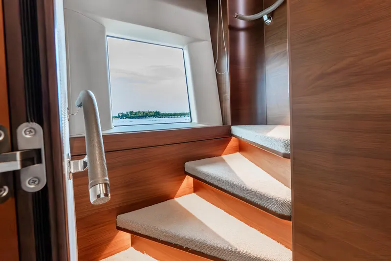 Slide: The Image of Luxurious interior of 2018 Princess F-68 yacht with elegant seating and dining area. - 32