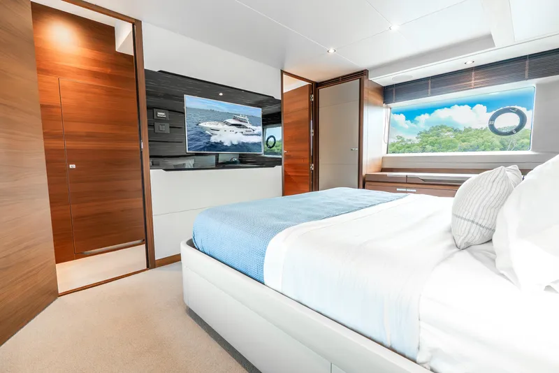 Slide: The Image of Luxurious 2018 Princess F-68 yacht cockpit with modern controls and plush seating. - 36