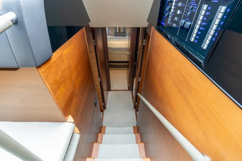 Slide: The Image of Luxurious interior staircase of 2018 Princess F-68 yacht with scenic window view. - 40
