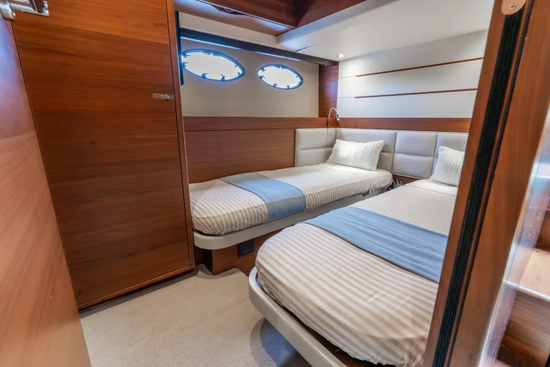 Slide: The Image of Luxurious bedroom interior of 2018 Princess F-68 yacht with modern design and elegant bedding. - 51