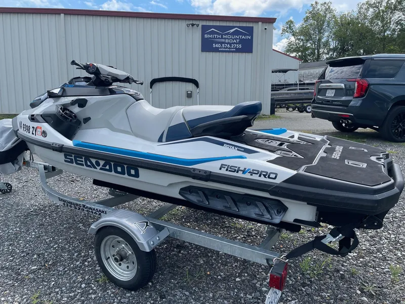 Slide: The Image of 2022 Sea-Doo Fishpro Sport 170 on trailer, parked outside dealership. - 5