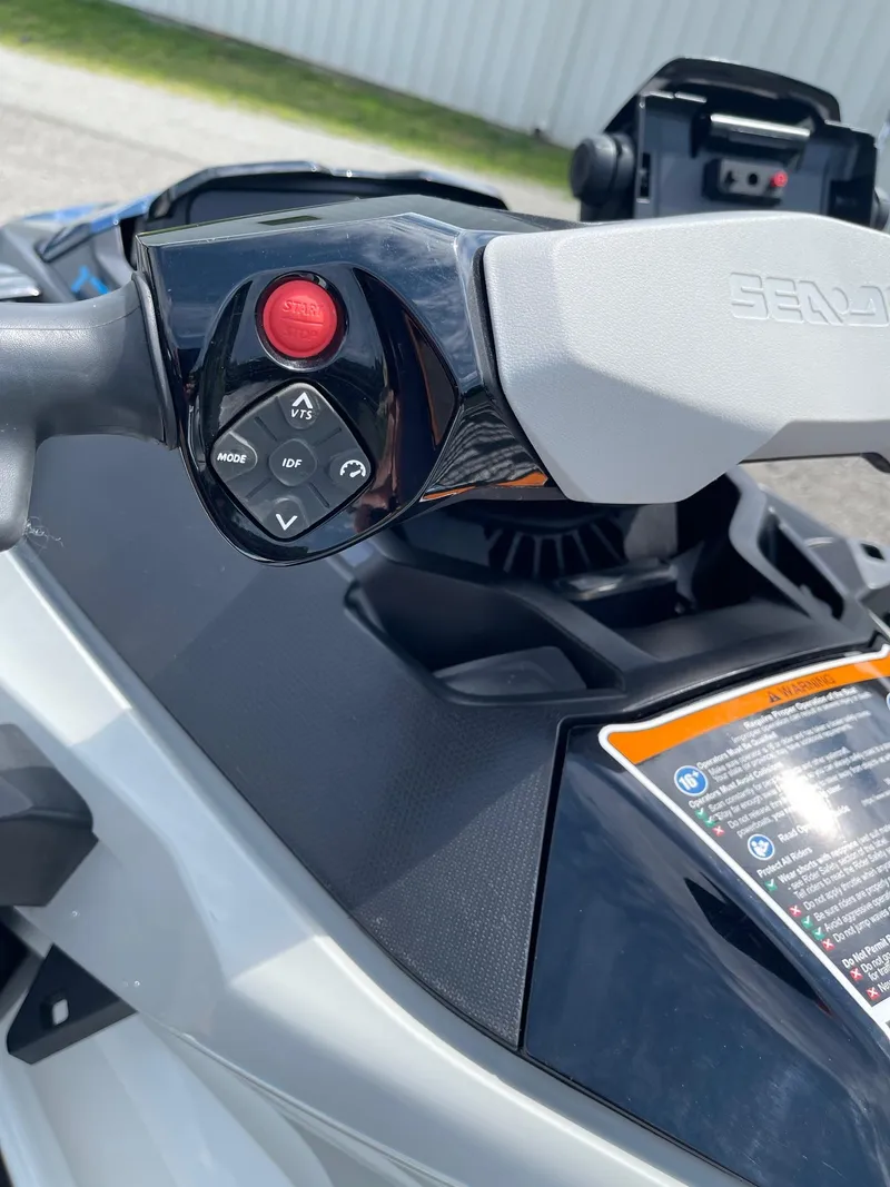 Slide: The Image of 2022 Sea-Doo Fishpro Sport 170 handlebar controls with start button and display. - 9