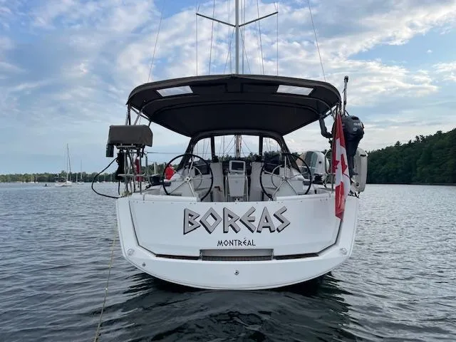Slide: The Image of Jeanneau Sun Odyssey 389 sailboat, 2018 model, named Boreas, docked on calm water. - 1