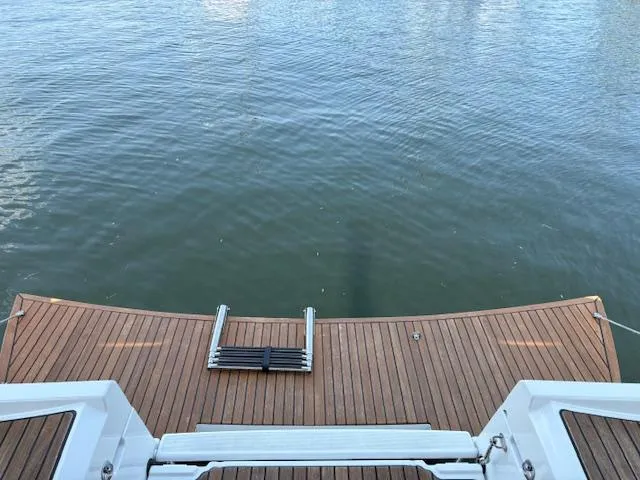 Slide: The Image of Jeanneau Sun Odyssey 389, 2018, swim platform with ladder on calm water. - 5