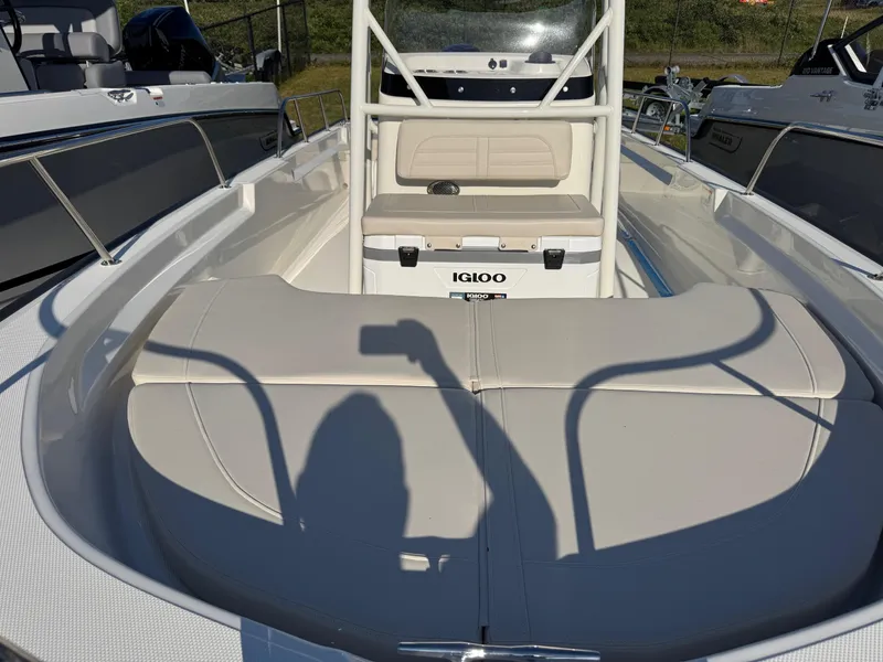 Slide: The Image of 2025 Boston Whaler 190 Montauk boat interior with seating and Igloo cooler. - 7