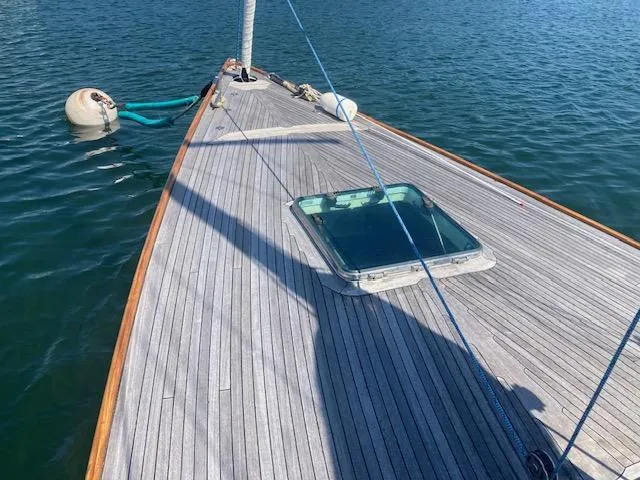 Slide: The Image of 2005 Morris M36 Daysailer deck with hatch, moored on calm water. - 9