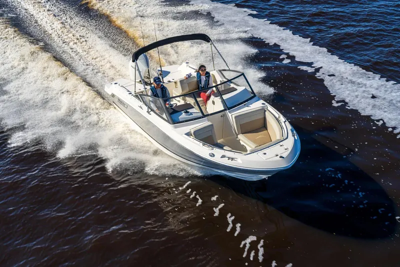Slide: The Image of 2025 Boston Whaler 210 Vantage cruising on open water, showcasing sleek design and performance. - 8