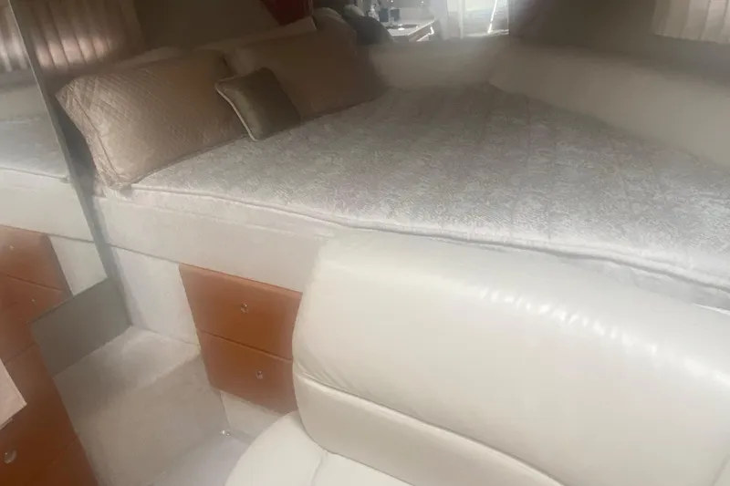 Slide: The Image of Interior of 2012 Formula 31PC boat with bed and seating area. - 14