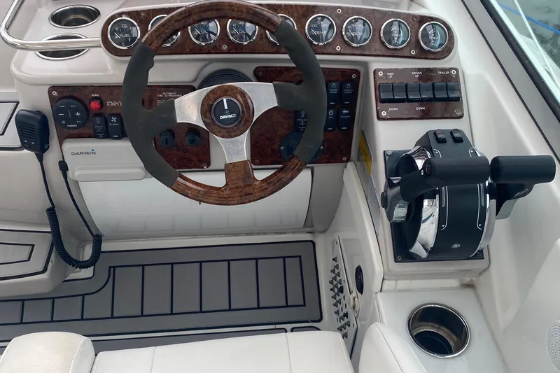 Slide: The Image of Steering console of a 2012 Formula 31PC boat with gauges and controls. - 19