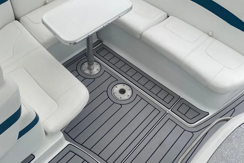 Slide: The Image of 2012 Formula 31PC boat interior with white seating and sleek flooring. - 28