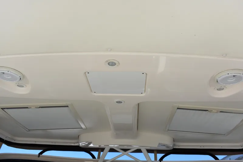 Slide: The Image of 2008 Tiara Sport Fish boat ceiling with built-in lights and hatches. - 20