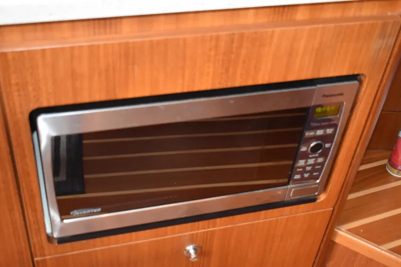 Slide: The Image of Built-in microwave in 2008 Tiara Sport Fish boat kitchen. - 30