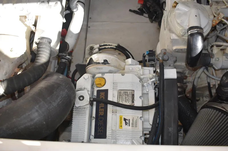 Slide: The Image of 2008 Tiara Sport Fish engine compartment with Kohler diesel generator. - 32