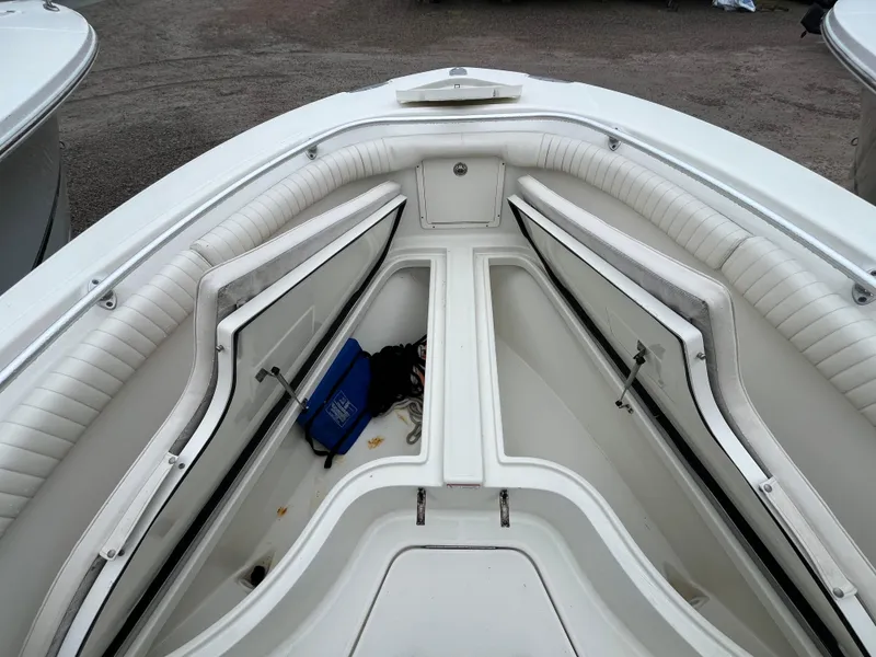 Slide: The Image of 2007 Hydra-Sports 2500CC boat interior with open storage compartments and seating. - 10