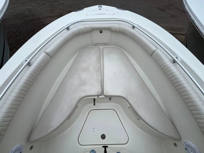 Slide: The Image of 2007 Hydra-Sports 2500CC boat interior, featuring cushioned seating and storage compartments. - 20