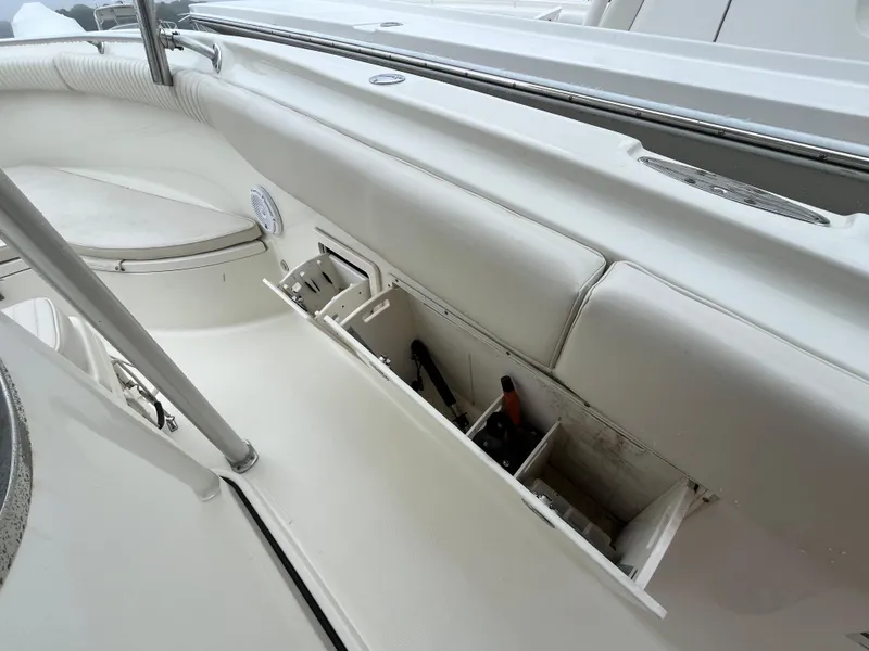 Slide: The Image of 2007 Hydra-Sports 2500CC boat interior with open storage compartment and seating area. - 28