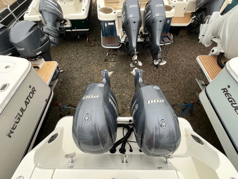 Slide: The Image of 2007 Hydra-Sports 2500CC boat with twin Yamaha 200 outboard engines, surrounded by other boats. - 32